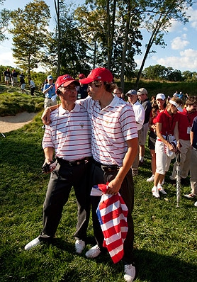 Sweet relief: USA Captain George "Buddy" Marucci,<br>a Merion club member, shares a celebratory moment<br>with Peter Uihlein. (John Mummert/USGA)