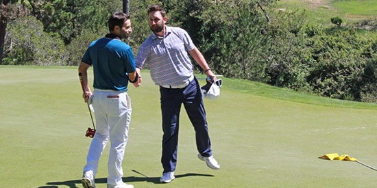 Matt Cohn (L) is congratulated by Bobby Bucey after his playoff win (NCGA photo)