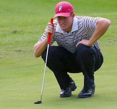 Robby Shelton of the Crimson Tide lines up a putt<br>U. of Alabama photo