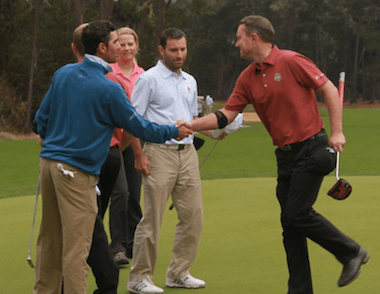 Nick Moore (left) shakes hands with Joe Dolby (right)<Br>with Matt Cohn of the NCGA in the middle (NCGA photo)