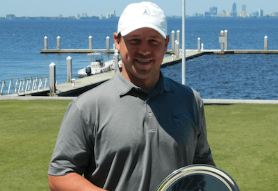 Joseph Deraney holds 2016 Timuquana Cup trophy <br>(Photo Courtesy of Clint Avret)</br>
