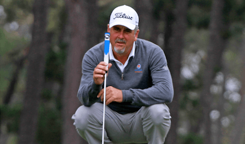 Dale Bouguennec reads a putt on Tuesday <br>(NCGA Photo)</br>