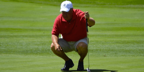 Keith Decker lines up a putt at the Virginia Senior Amateur <br>(VSGA Photo)
