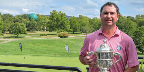 Matt Chandler holds Virginia Mid-Amateur trophy for second straight year <br>(VSGA Photo)
