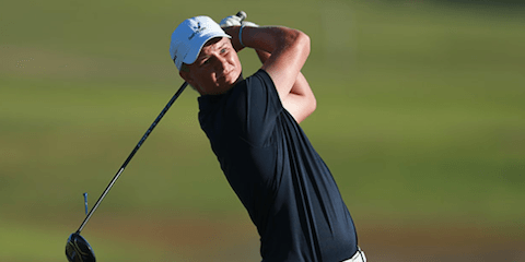 Cameron John watches his drive on the 18th hole <br>(Golf Australia Photo)