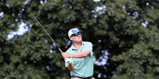 First round leader Todd Wood watches a drive on Monday <br>(MGA Photo)