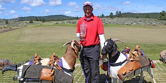 Darren Kuhn with Silvies Valley Ranch goat caddies (PNGA photo)
