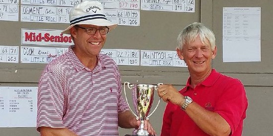 Chris Jenkins (L) accepts the trophy for the 10th time (Democrat-Gazette photo)