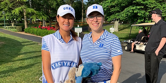 Gina Kim caddied for her Duke teammate Virginia Elena Carta (Duke Athletics photo)
