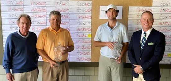 Tim Jackson (left) and Craig Smith -- both holding trophies