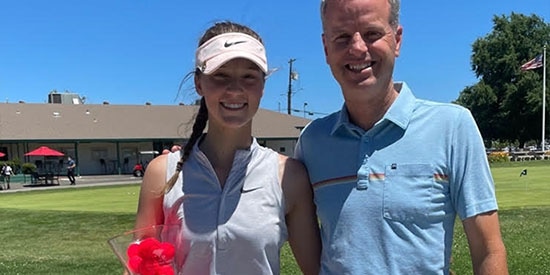 Ellie Bushnell and Haggin Oaks Director of Golf Mike Woods