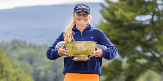 Morgan Smith with the championship and junior trophies.