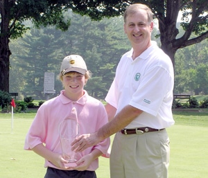 receives congratulations for winning Jr. Jr. Championship