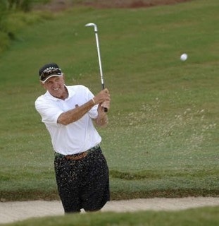 The defending champ blasts out of a bunker