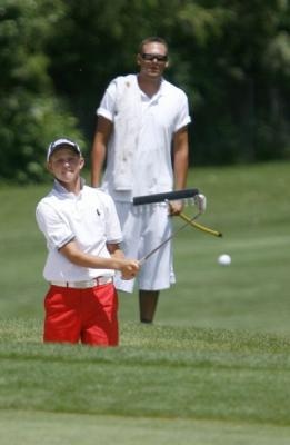 Zac Blair and his caddy Stu Gold on the<br>way to winning the Utah State Amateur<br>(Stephen Holt, Salt Lake City Tribune)