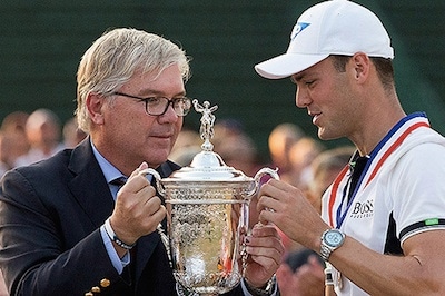 USGA President Tom O'Toole Jr. <br>presents the 2014 U.S. Open trophy to Martin Kaymer