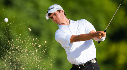 Alex Smalley blasts out of the 12th hole on the South Course <br>(USGA Photo)