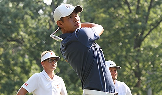 Co-leader Collin Morikawa tees off while defending champ Dylan Meyer (left) looks on