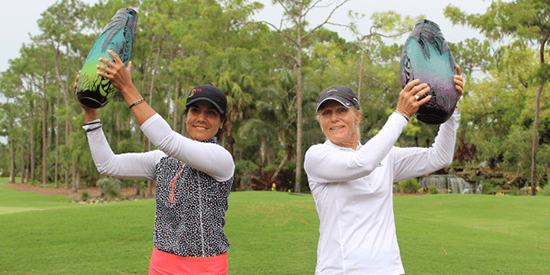 Mary Jane Hiestand (right) raises senior trophy at Florida Women's Open. <br>Sandra Angulo Minarro won the title (FSGA photo)