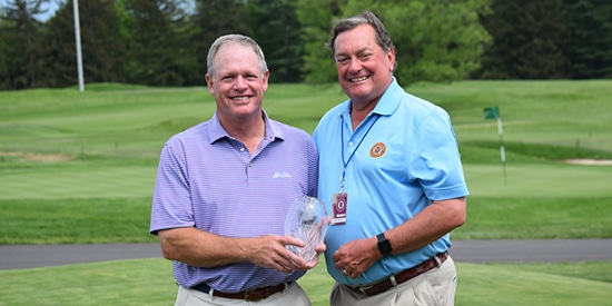 Bob Beck accepts his trophy (Pennsylvania Golf Association photo)