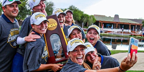 Ole Miss poses for a trophy selfie. (Photo Credit: Ole Miss Athletics)