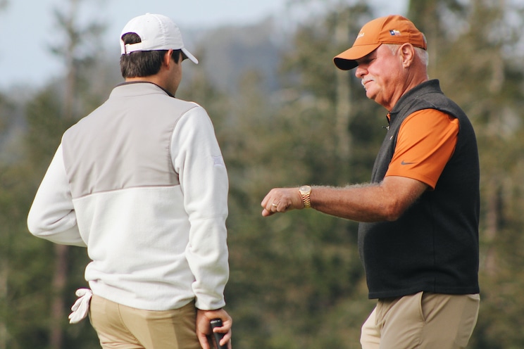 Texas head coach John Fields and freshman Alejandro Gomez
