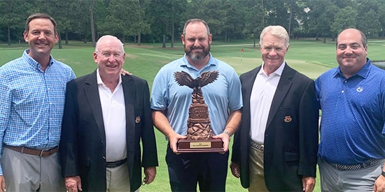John Hunter (center) with members of the CWI Tournament Committee (CWI photo)