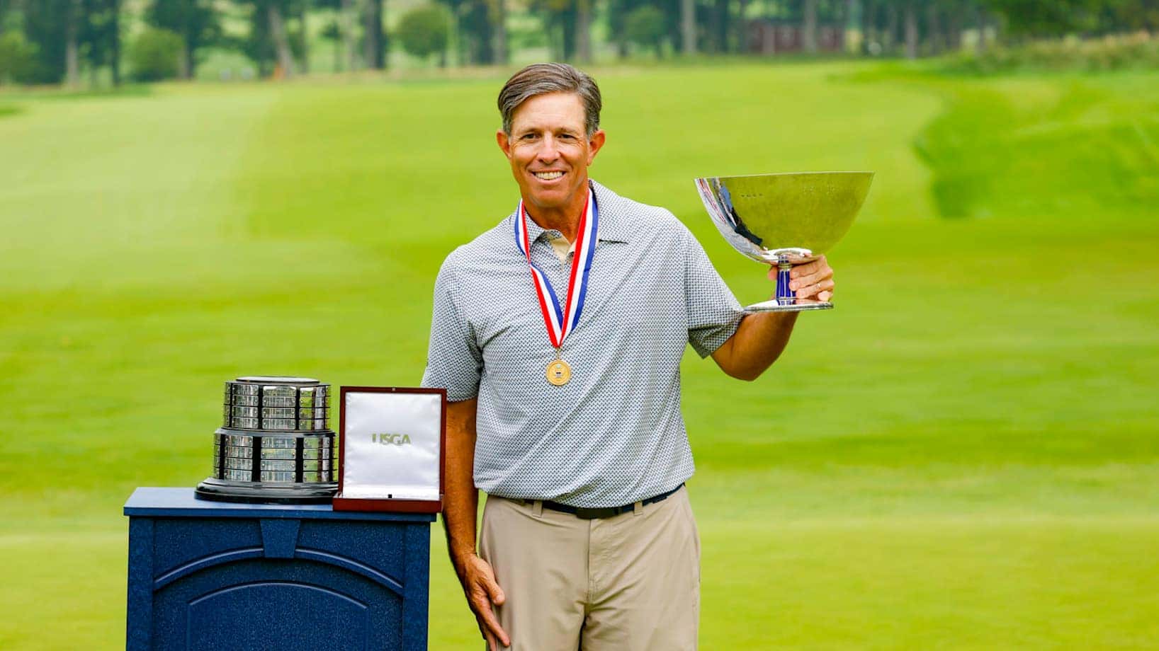 Mike Sposa with the Frederick L. Dold Trophy after winning the 71st U.S. Senior Amateur at Baltimore Country Club.