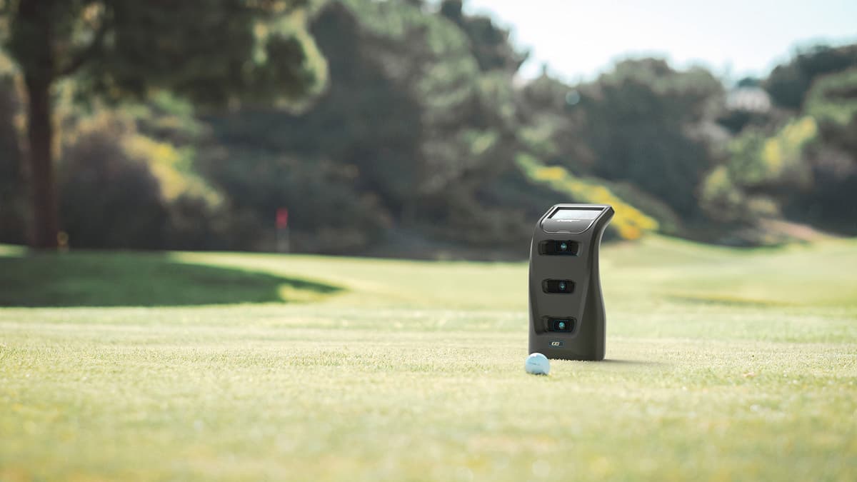 Foresight GC3 launch monitor set up on a golf course fairway