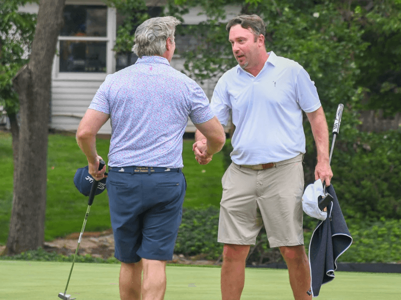 Jason Pool, right, shakes hands with semifinal opponent Timothy Hummel