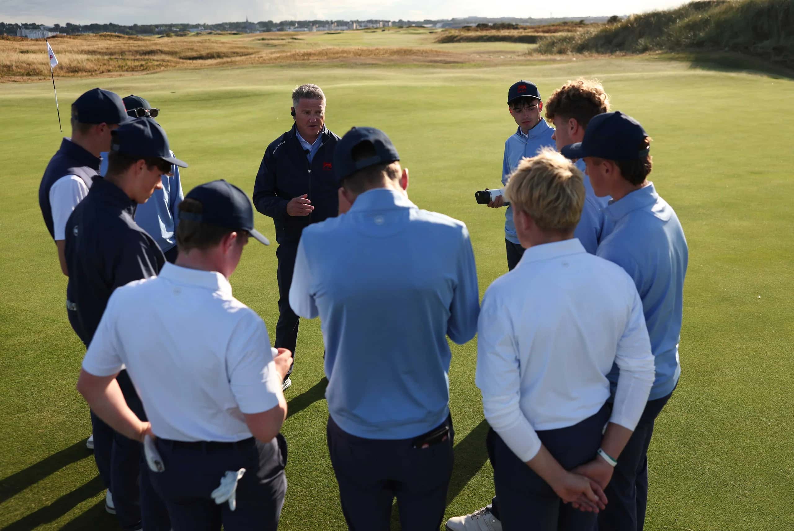GB&I captain Niall MacSweeney gathers his team for a huddle after the opening day of the Jacques Léglise Trophy.