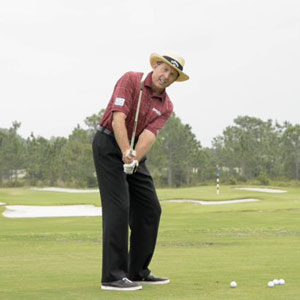 David Leadbetter demonstrates 
the more compact motion of the A Swing