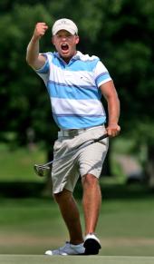 Brian Noonan reacts to his 35-foot<br>birdie putt which forced the playoff