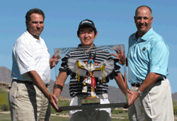 AGA Vice Presidents Drew Woods (L) and Jay<br>Anderson (R) Present Andrew Yun with a<br>Kachina Trophy