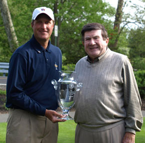 Sean Knapp, left, is awarded the championship trophy by<br>Gene Dinnocenti, Hickory Valley club owner