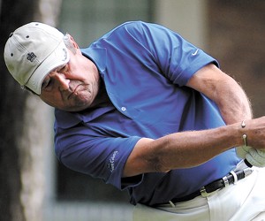 Lufkin’s Ford Cartwright follows through during the<br>Senior Temple Cup at Crown Colony Country Club<br>(photo by Joel Andrews, Lufkin Daily News)