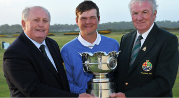 Irish Amateur Champion Rhys Pugh (Wales).<br>GUI President, Eugene Fayne (right)<br> JJ Murphy, Captain, The Royal Dublin Golf Club.