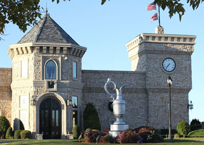 The Clubhouse at Royal Links, with a replica of<br>the Claret Jug in the foreground