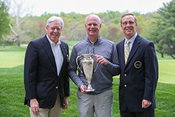 Zahringer (c) with MGA Rules and Comp. Chair <br>Rob Bluestone (left) and President Steve Boyd