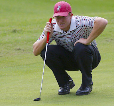 Robby Shelton of the Crimson Tide lines up a putt<br>U. of Alabama photo