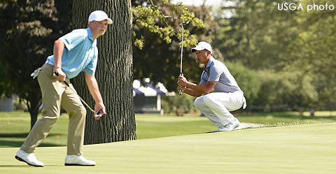 19-hole winners Shuai Ming Wong and partner Frankie Capan react to<br>a putt that narrowly missed on the 17th green