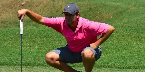 Clay Guerin reads a putt at the Country Club of Mobile <br>(Alabama Golf Association)