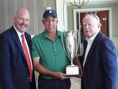 Tom Trakoval holding the 2015 Long Island Senior Amateur trophy <br>(LI Golf Association Photo)