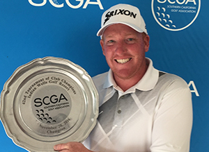 Danny Thogmartin holds SCGA Tournament of Club Champions trophy <br>SCGA Photo)