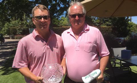 Kelly Cup champion Tyler Crawford (left) with<br>tournament chairman Jim Grover
