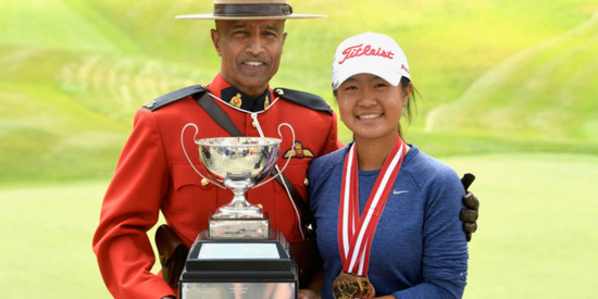 <center>Susan Xiao accepts her trophy following her 5-under-par performance <br> [photo courtesy of Golf Canada]</br></center>
