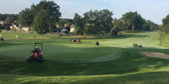 The grounds crew at Wethersfield CC was busy putting in some last minute work <br>prior to the start of day one <br>(NE Golf Association Photo)