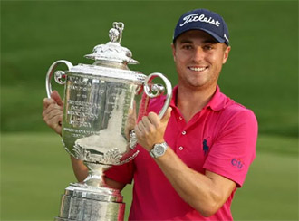 Justin thomas with the PGA Championship trophy
