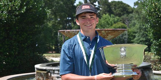 Charlie Flynn holds the Southern Junior Championship trophy <br>(Southern Golf Association Photo)