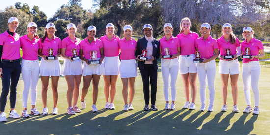 Stanford poses with tournament host Condoleeza Rice